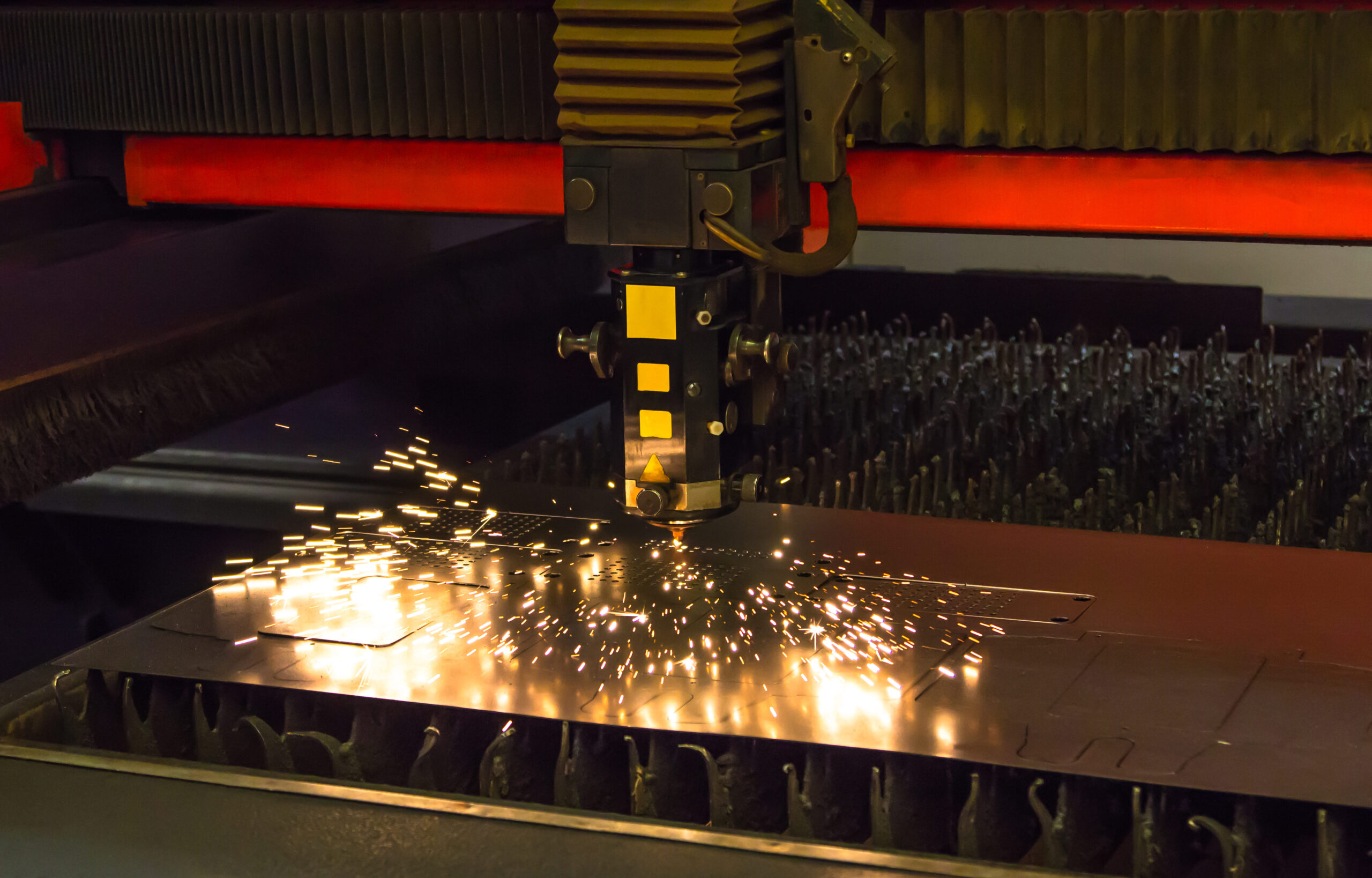 Laser Cutting Machine Cutting Metal With Sparks